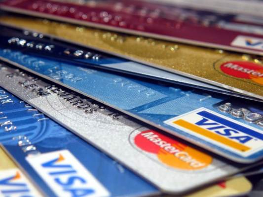 A close up shot of a stack of credit cards.