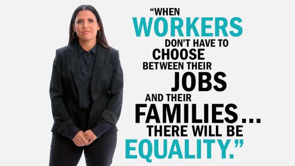 Dina Bakst has long black hair and wears a black blouse, blazer, slacks, and hoop earrings. Next to her is copy reading, "When workers don't have to choose between their jobs and their families... there will be equality."