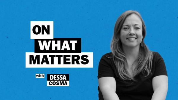 Dessa Cosma has long wavy hair and is wearing a black v-neck t-shirt. To her left appears the text: On what matters with Dessa Cosma.