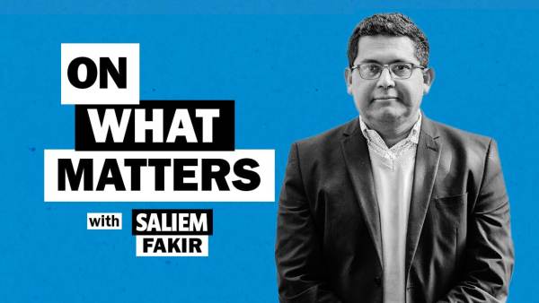 Saliem Fakir has dark cropped hair and wire frame eye glasses and is wearing a dark blazer over a light sweater and button down shirt. To his left appears the text: On what matters with Saliem Fakir